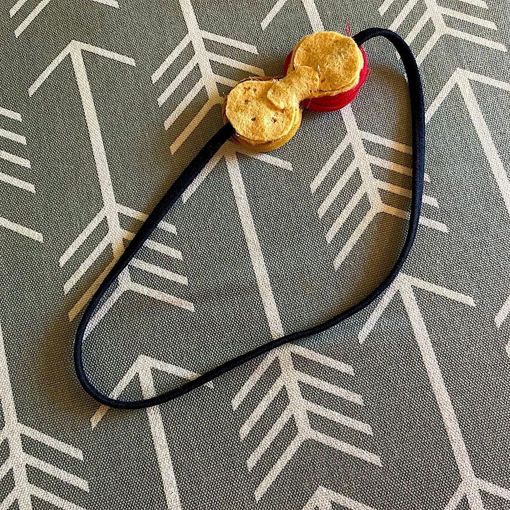 Rosette Red & Gold 8.5” Black Stretchy Headband